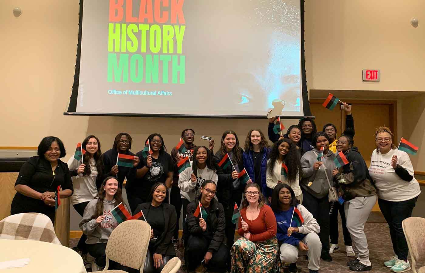 Students posing at Black History Month event